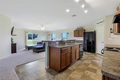 1708 NE Juanita Place, Cape Coral, FL 33909 - photo 7