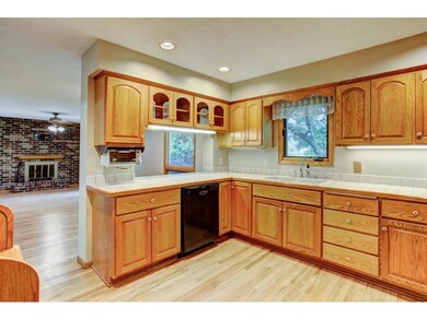 Eat-in Kitchen has hardwood floors, custom raised 