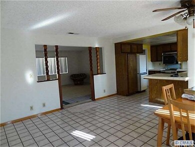Dining area leads to large kitchen