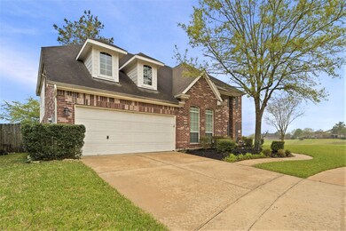 The full automatic sprinkler system in the front and back yards keep the grass and landscaping lush all year.
