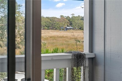Partial marsh view from inside living room