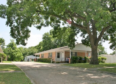 Concrete driveway between the 2 duplexes