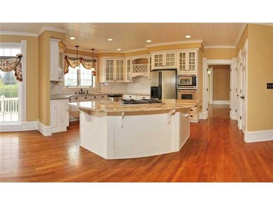 Kitchen. Gourmet Kitchen with Granite Counters and Hardwood Floors