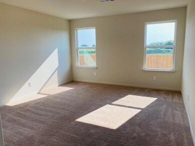 Unfurnished room with carpet flooring