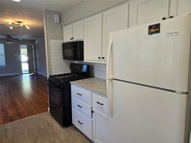 705 Clarence St, Tomball, TX 77375 - photo 2