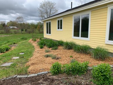 More mature landscaping around patio