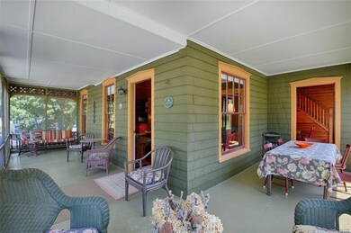 Spacious wraparound porch area for entertaining an