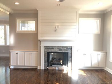 Custom Built Ins and Shiplap over Fireplace