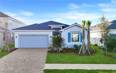 View of front of property featuring an attached garage, stucco siding, decorative driveway, and a front lawn