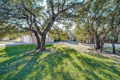 Almost an acre of gorgeous trees adorn this well l