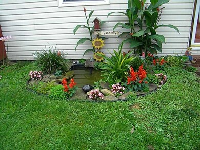 View. WATER POND IN FRONT YARD
