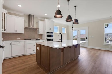 Photos are of a similar home