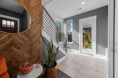 Entryway featuring light tile patterned floors