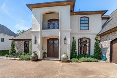 This beautiful stucco and brick veneer home is rea