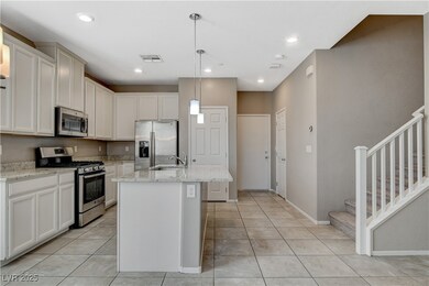 Kitchen featuring stainless steel appliances, ligh