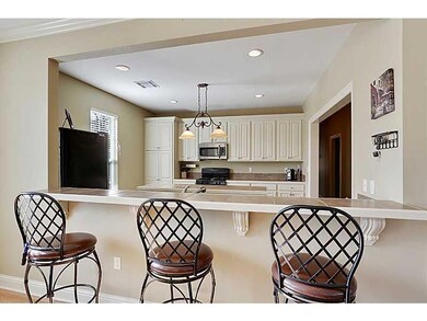 Other. Large bar gives onto a huge gourmet kitchen