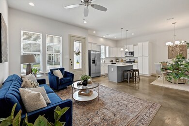 Spacious living area! Soaring ceilings, stained co