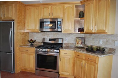 New Granite counter top, tiled backsplash, and sta