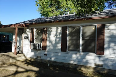 View of home's exterior featuring cooling unit
