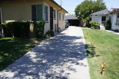 EAST SIDE DRIVEWAY TO CARPORT