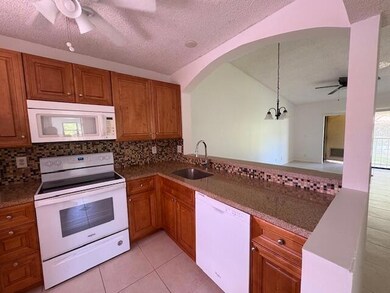 21938 Remsen Terrace unit D209, Boca Raton, FL 33433 - photo 3
