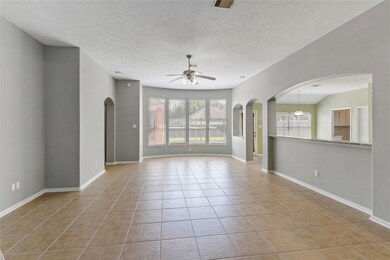 Large family room with tile floors, bay window, gr