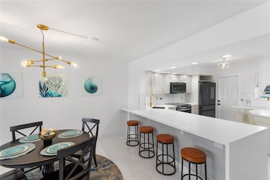 COASTAL LIVING AT ITS BEST FOR BEACH & BOAT LOVERS IN LAUDERDALE BY THE SEA. THIS REMODELED FULLY FURNISHED ~ TURNKEY SPLIT FLOOR PLAN FEATURES 2/BEDS 2/BATHS LOCATED DIRECTLY ON THE CANAL W/ AMAZING WATER VIEWS. KITCHEN FEATURES SAMSUNG BESPOKE SERIES APPLIANCES W/ FAMILY HUB, QUARTZ COUNTERTOPS, NEW TANKLESS HWH & WHOLE UNIT WATER FILTRATION. IN UNIT LG WASHER/ DRYER, 24