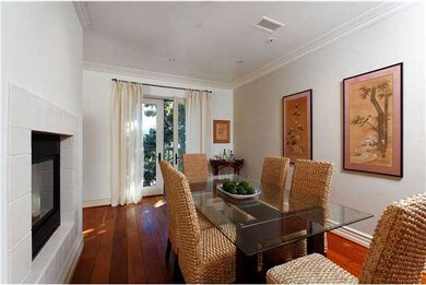 The Dining Room with cozy fireplace and French Doo