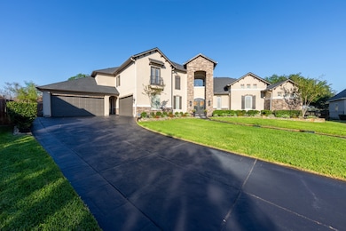 Generous driveway space allows ample guest or overflow parking, ideal for entertaining.