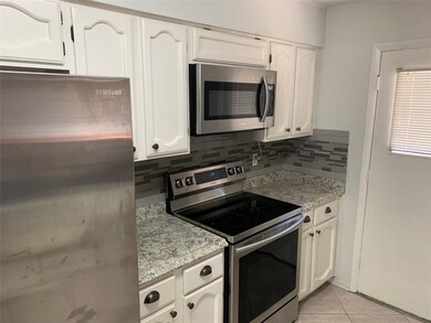 7836 Green Lawn Dr unit 7836, Houston, TX 77088 - photo 4