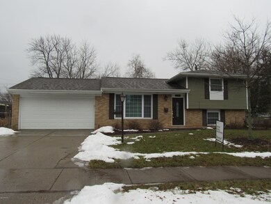 Brick and Vinyl Siding