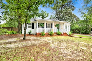 View of front of house with covered porch