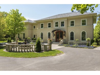 Located on Foote Lake with over 7 private acres!