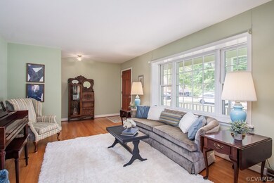 Sun-filled front Living room with large picture wi