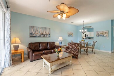 Living area with light tile patterned floors, base