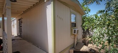 Covered porch area on the east side of the home