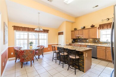 GRANITE COUNTERTOPS AND TILE BACKSPLASH