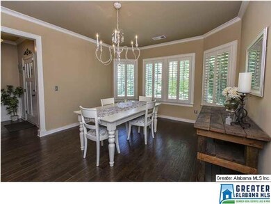 Formal dining complete with Gorgeous Hardwoods, up