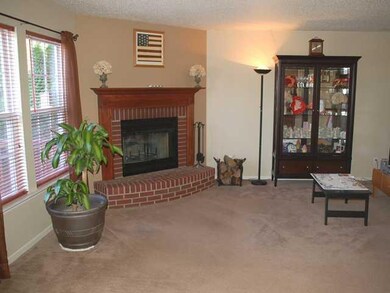 Family Room. Family Room with corner Brick Hearth Fireplace