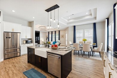 Kitchen featuring stainless steel appliances, a s