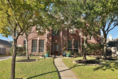 Tree shaded front yard.