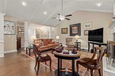 Living room is spacious and centered around a gas
