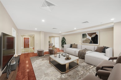 Living Room looking through to front door down Ent