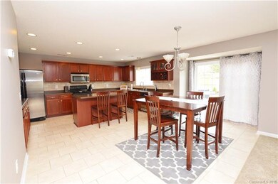 Open floor plan. Sunny Breakfast area