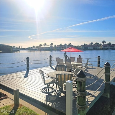 Dock with a deck with water view