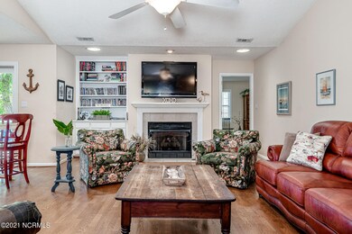 Open concept living area w/ fireplace