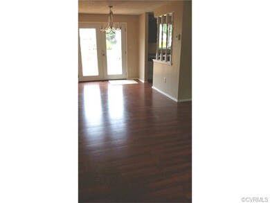 Dining room offers french doors that opens to deck
