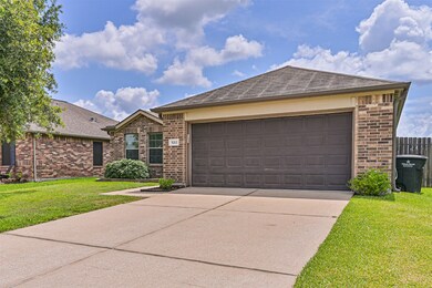 Well-kept single-story brick home with a two-car g