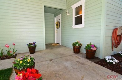 Cute front door entrance with a covered entrance!