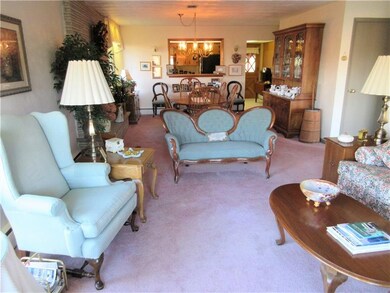 Living room is open to dining room, great for ente